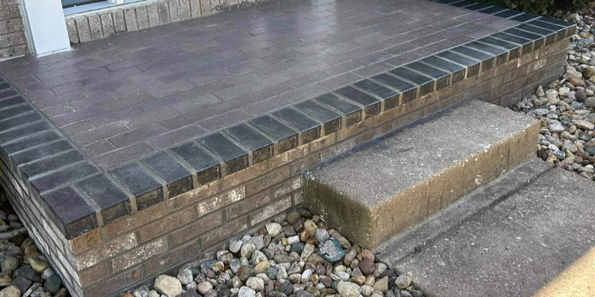 Are brick patios better than concrete patios?